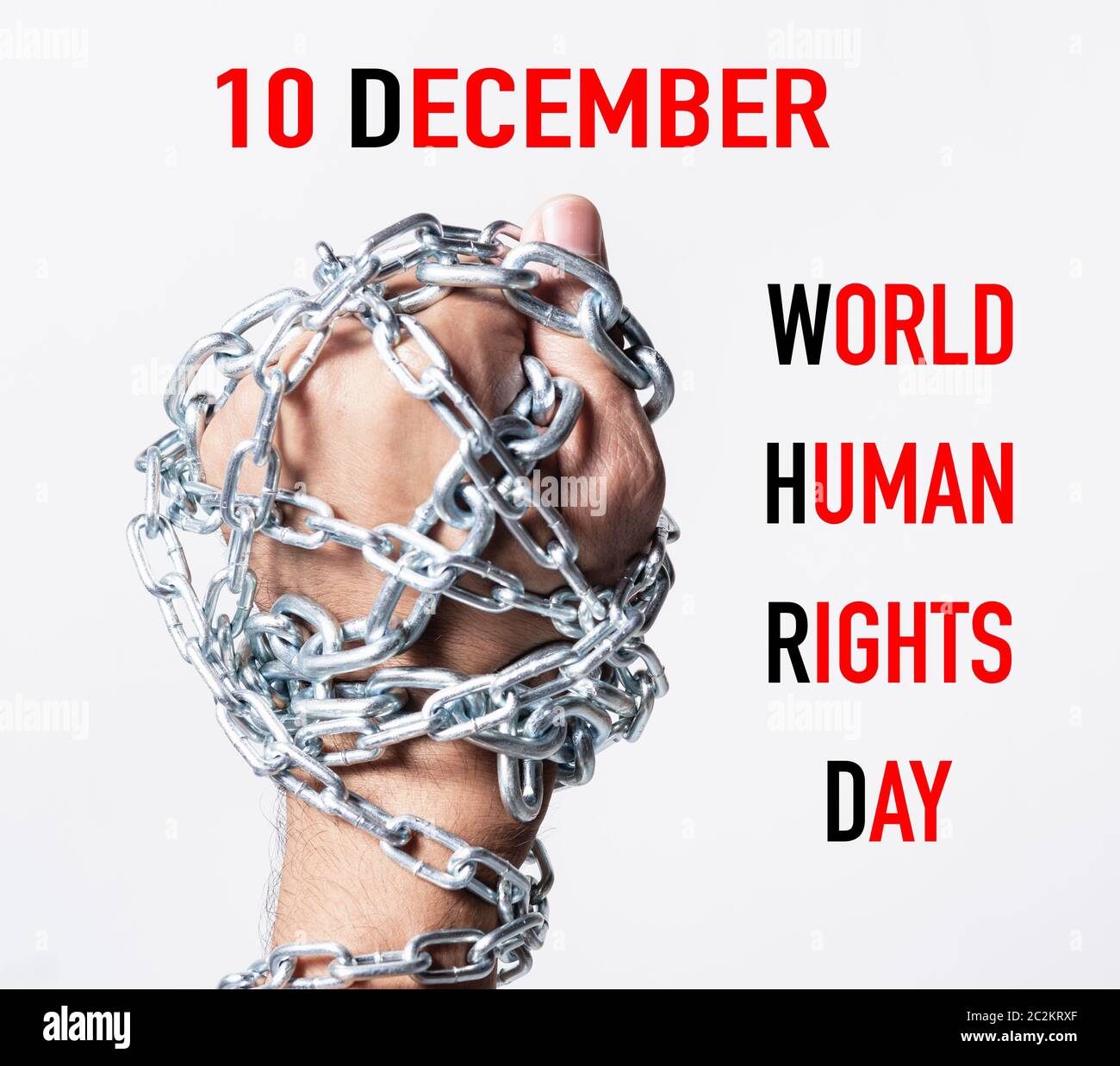 Poing enchaînés avec les mains 10 décembre Journée des droits de l'homme monde texte sur fond blanc, la Journée des droits de l'concept Banque D'Images