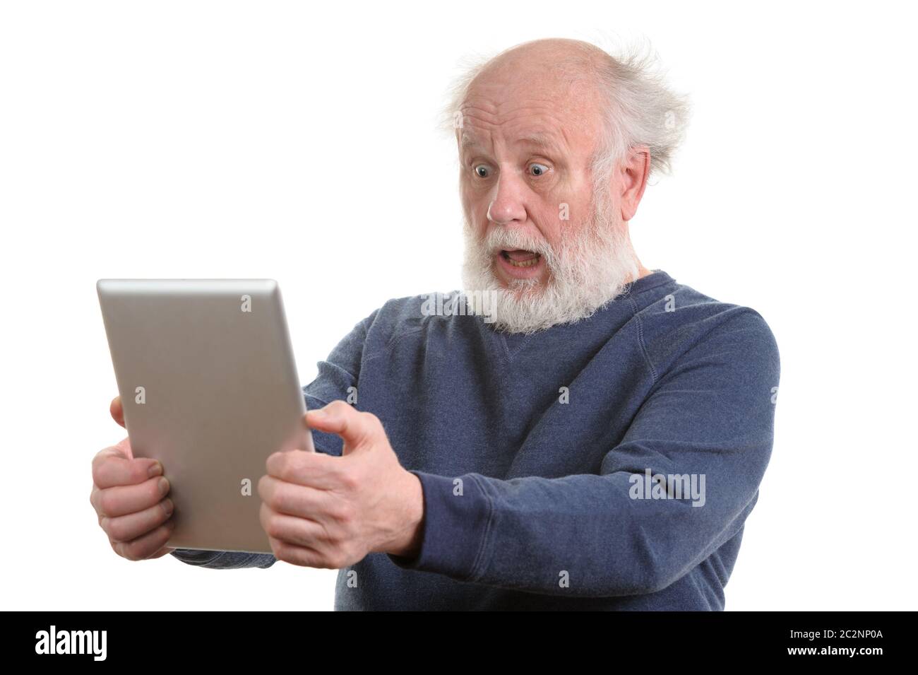 Funny choqué old man using tablet computer isolated on white Banque D'Images