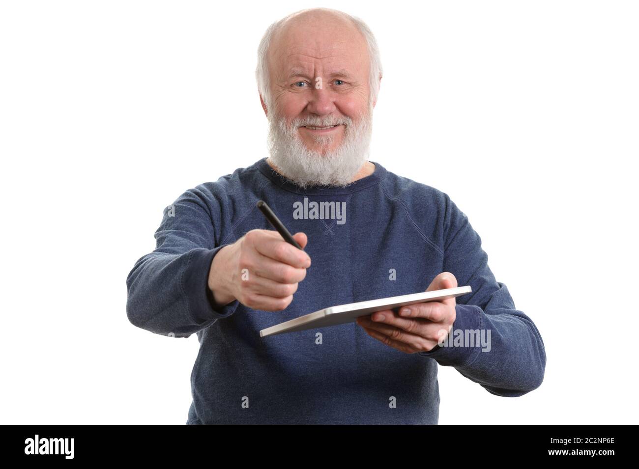 Funny old man using tablet computer isolated on white Banque D'Images