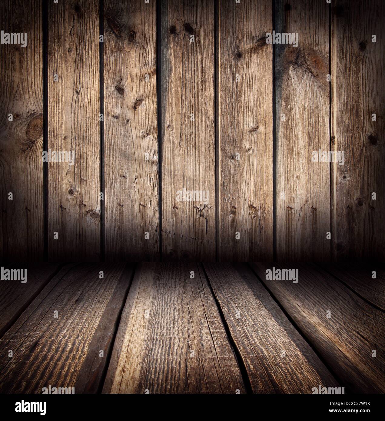 Arrière-plan de planches en bois rugueuses adjacentes au mur Banque D'Images