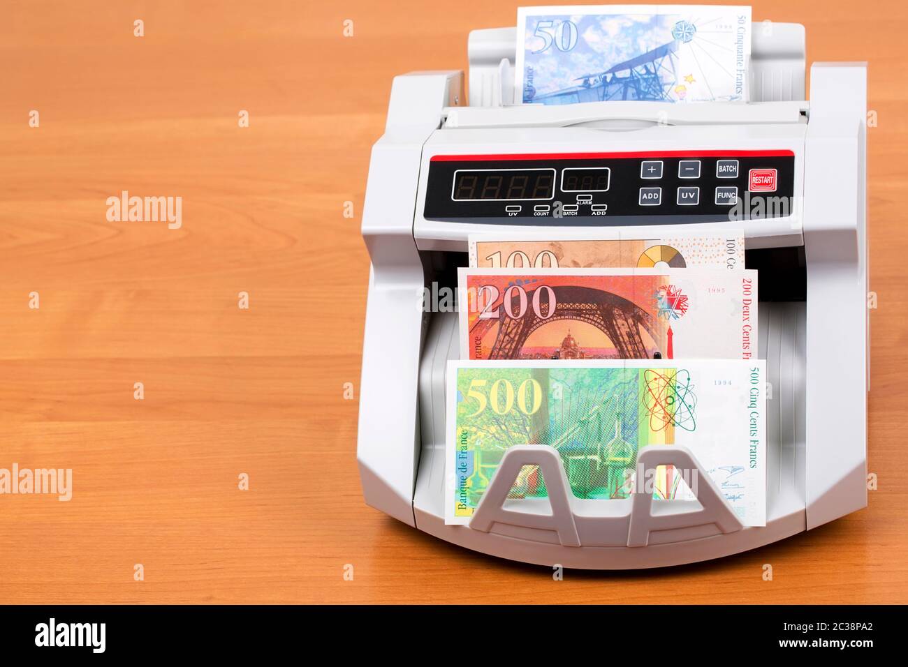 L'argent de France dans une machine de comptage Banque D'Images