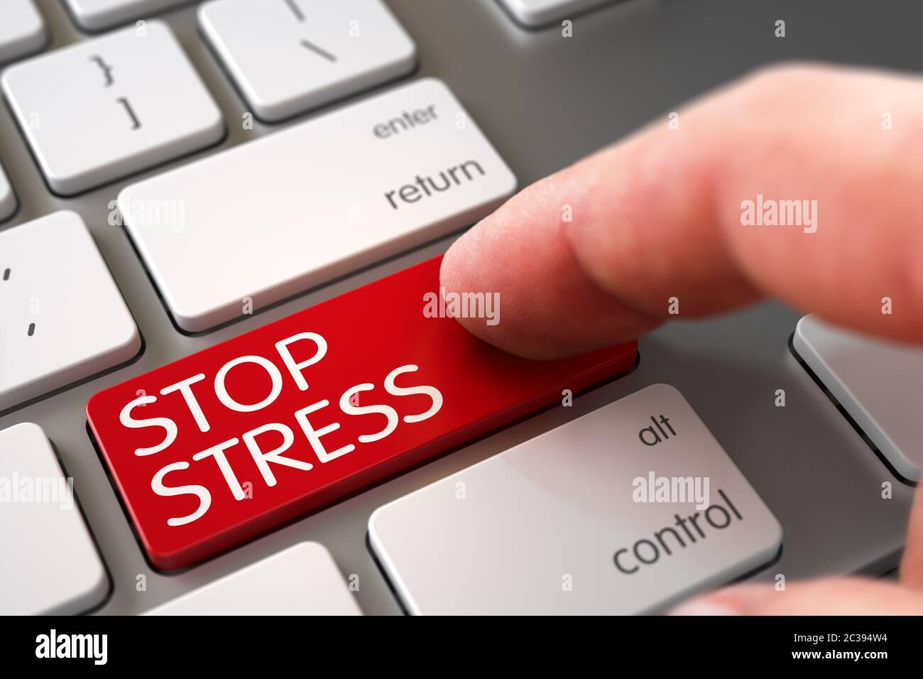 Clavier en aluminium avec bouton Stop stress Red. Mise au point sélective sur le bouton Arrêter stress. Homme doigt appuyant sur la touche Stop stress du clavier de l'ordinateur portable. R 3D Banque D'Images