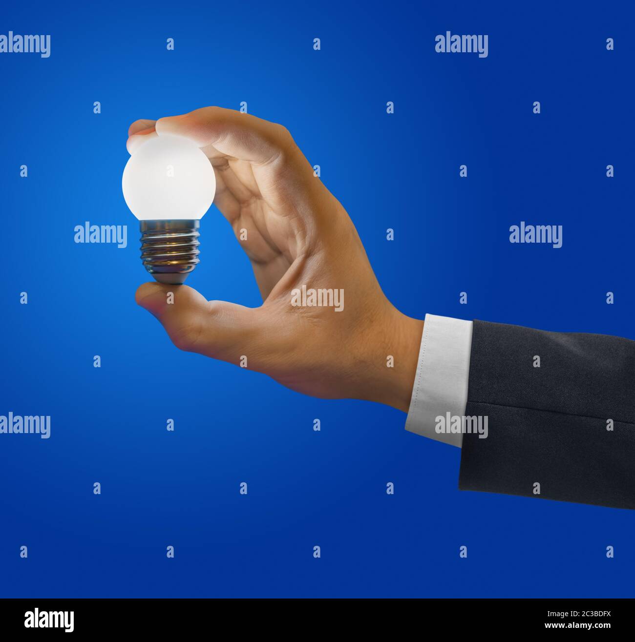 Lampe d'éclairage en main bleue Banque D'Images