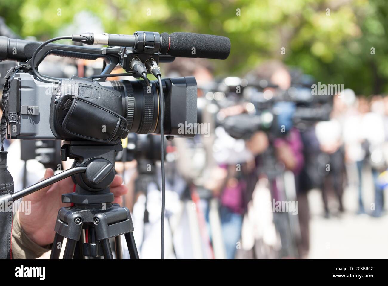 Conférence de presse. La couverture d'un événement avec une caméra vidéo. Banque D'Images