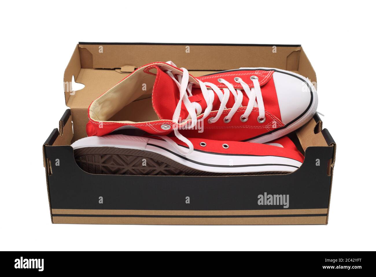 Nouveaux sneakers en toile rouge dans la boîte Photo Stock - Alamy