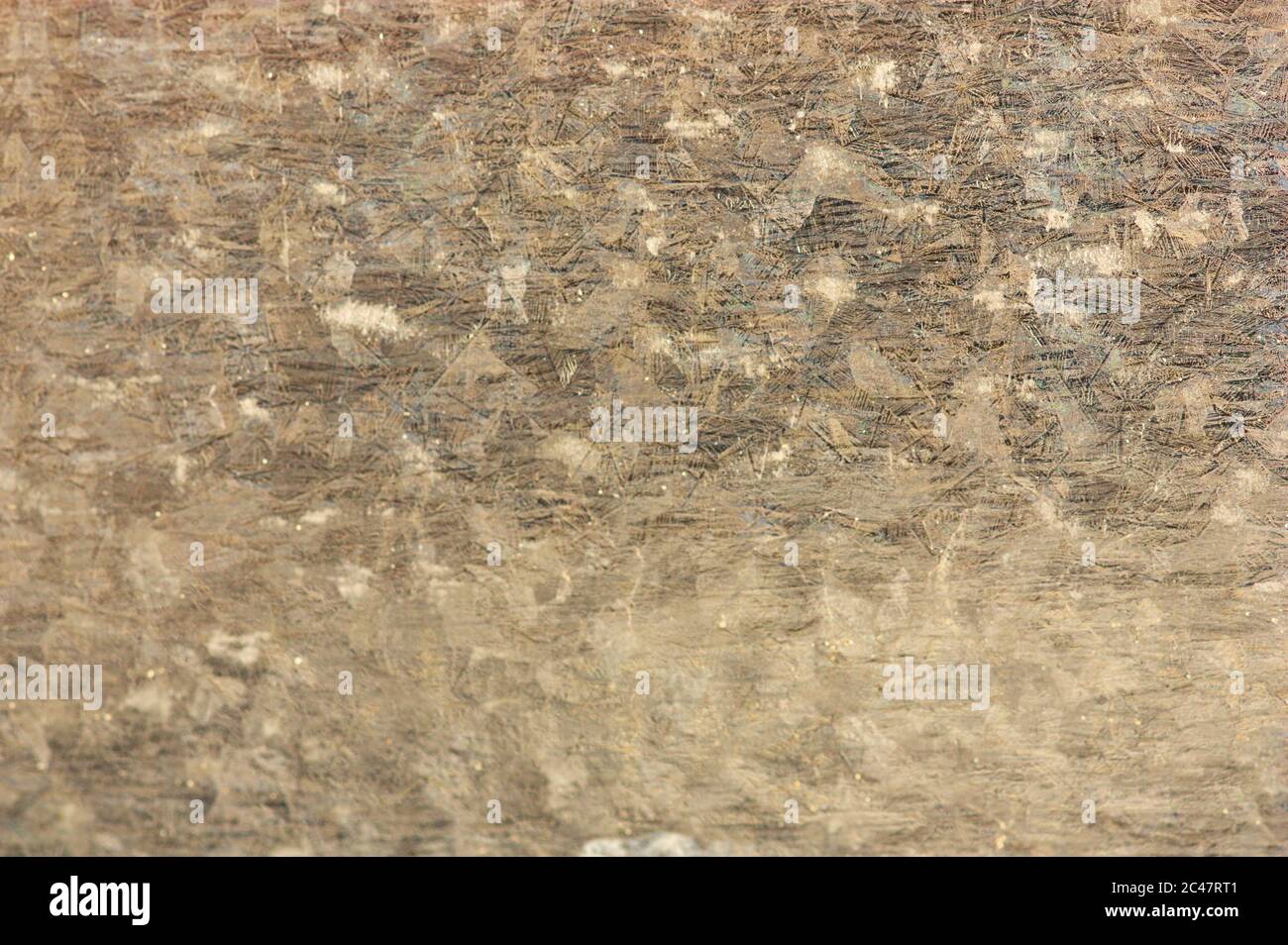 Image d'un verre translucide de couleur grise qui recrée un motif abstrait pour les arrière-plans Banque D'Images