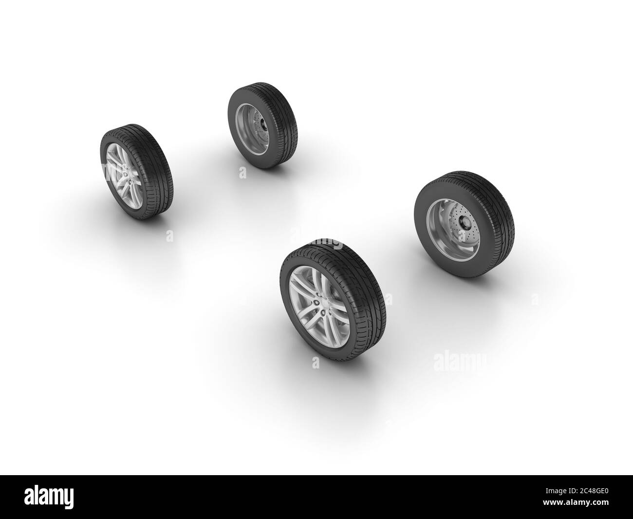 Roues de voiture avec pneu noir isolé sur fond blanc Banque D'Images