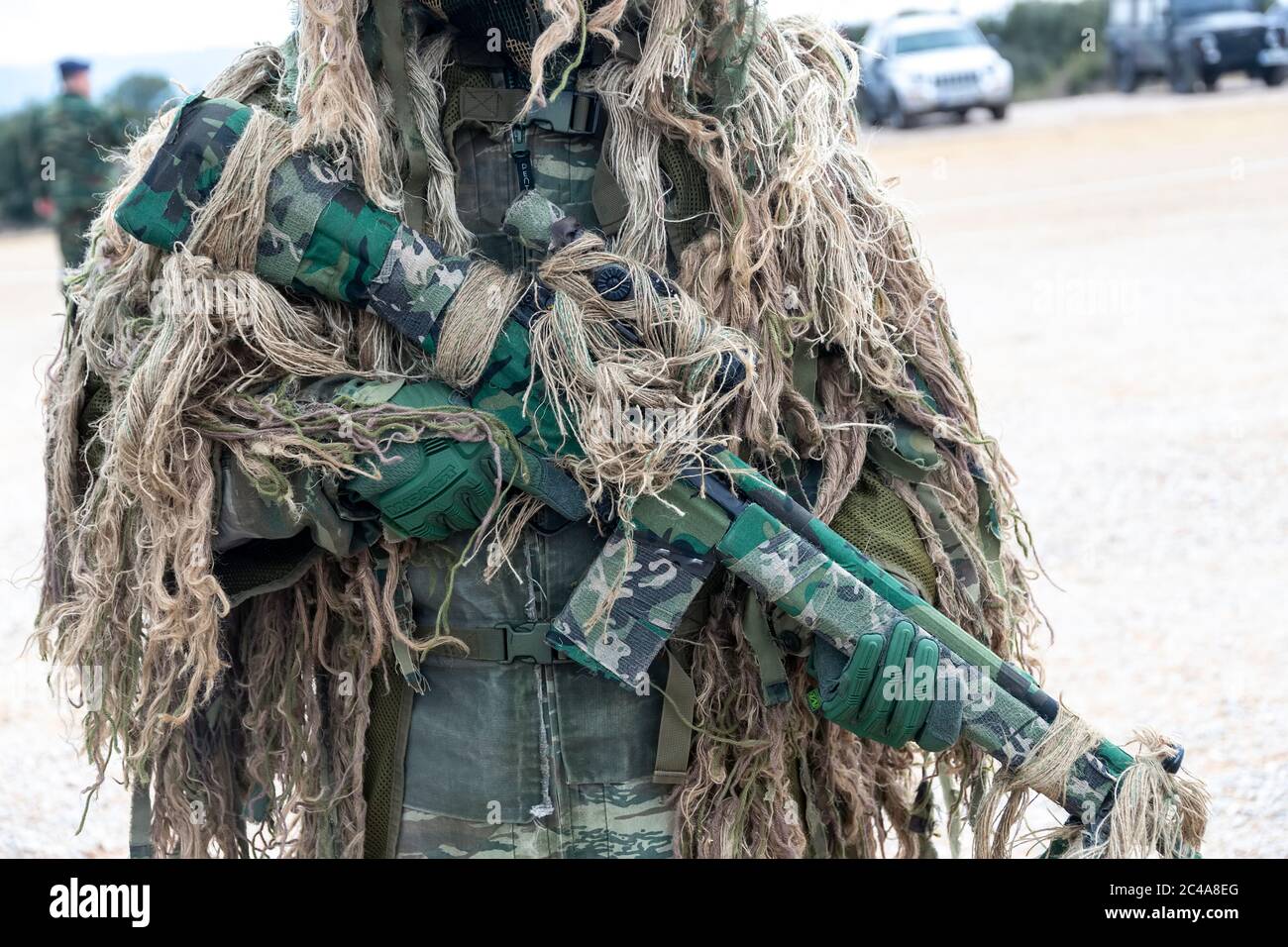 Askos, Grèce - 14 févr. 2020: Le commando militaire avec camouflage participe à un exercice militaire international avec un vrai feu (Golden Fleece -20) pari Banque D'Images