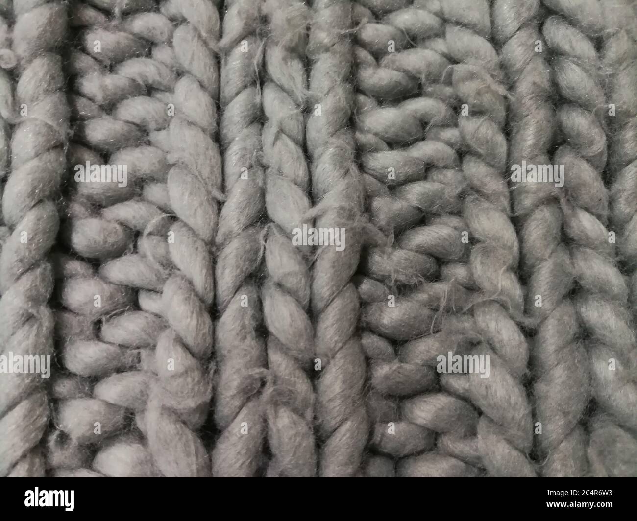 Détail d'un tapis rustique à grosse maille fait main. Toile de fond en  laine tricotée Photo Stock - Alamy