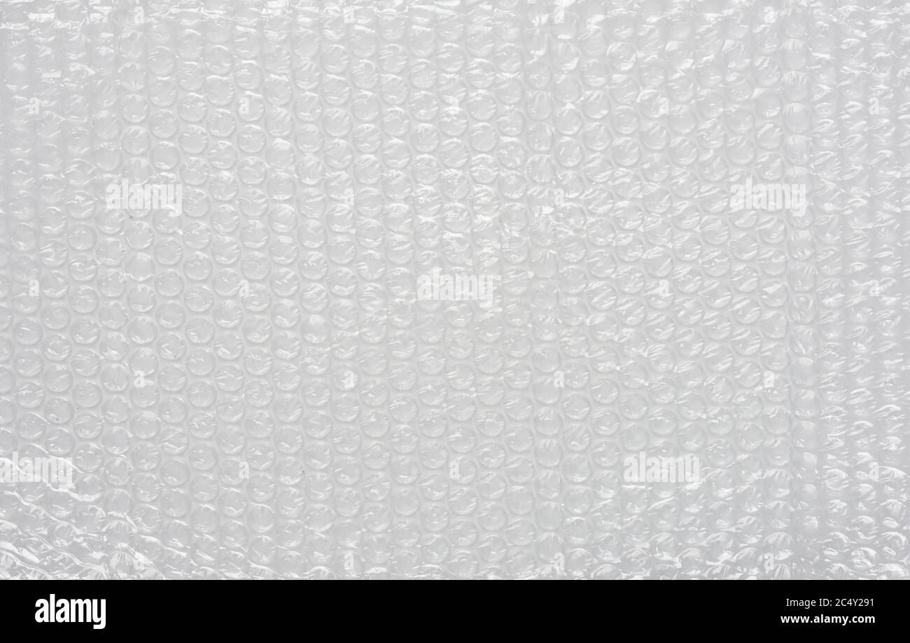 Texture de l'emballage à bulles blanches. Arrière-plan du film de coussin d'air. Banque D'Images