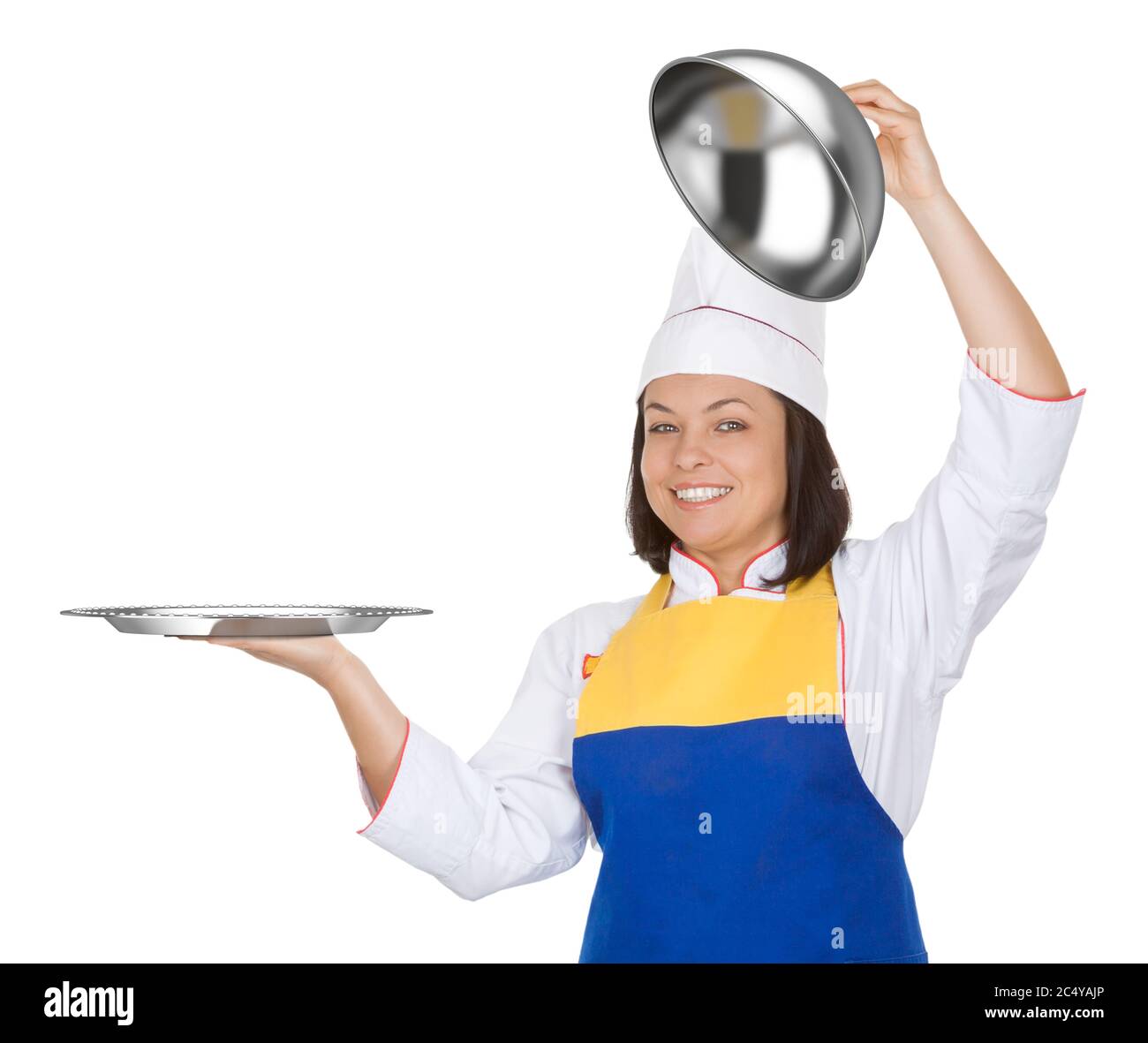 Belle jeune femme Chef avec le Restaurant cloche sur fond blanc Banque D'Images
