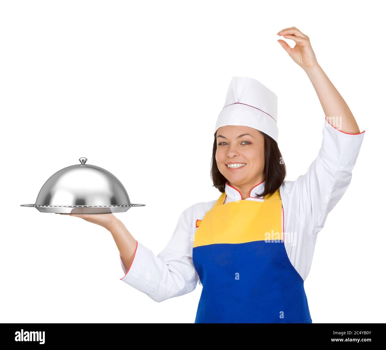 Belle jeune femme Chef avec le Restaurant cloche sur fond blanc Banque D'Images
