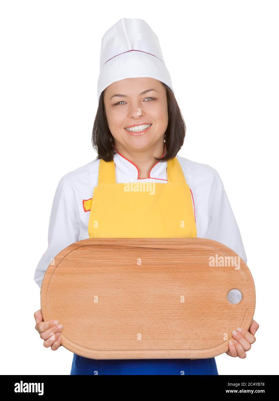 Belle jeune femme Chef avec planche à découper en bois sur fond blanc Banque D'Images