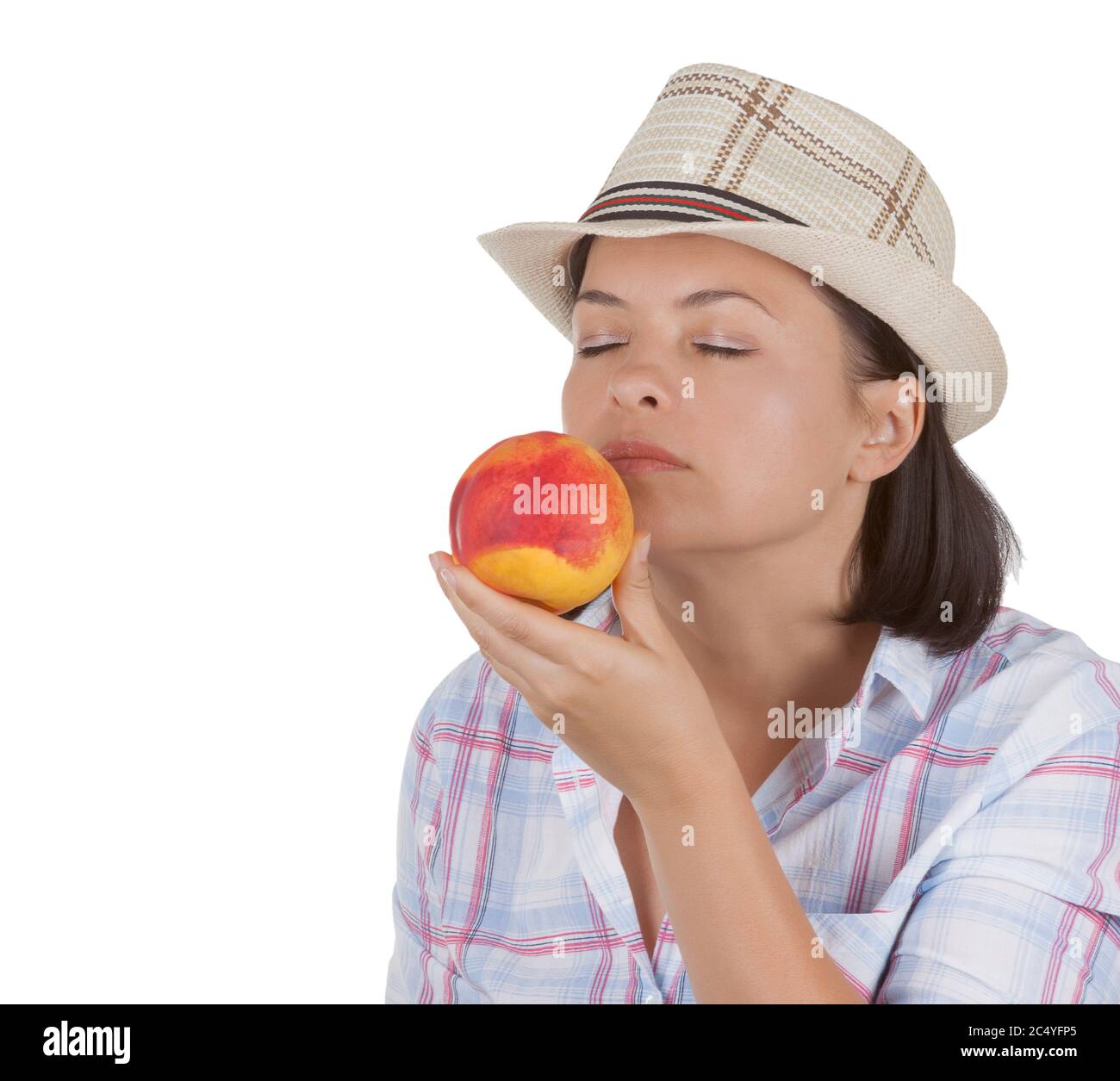 Bonne femme au chapeau avec un bonnet frais sur fond blanc Banque D'Images