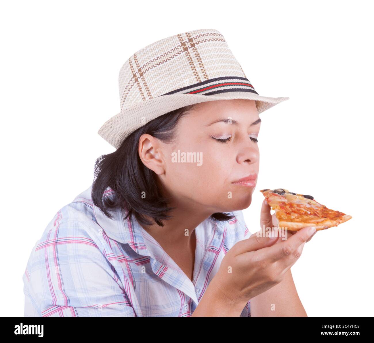 Belle jeune femme manger une tranche de pizza sur un fond blanc Banque D'Images