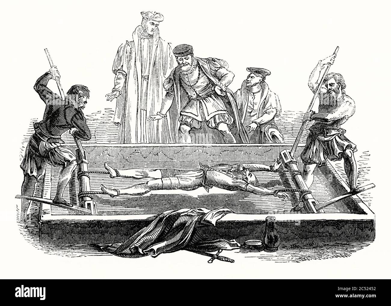 une-vieille-gravure-montrant-l-utilisation-de-the-rack-pour-la-torture-au-moyen-age-elle-a-ete-utilisee-pour-la-premiere-fois-en-grande-bretagne-vers-1450-le-rack-est-un-dispositif-de-torture-compose-d-un-cadre-rectangulaire-habituellement-en-bois-avec-un-rouleau-a-l-une-ou-aux-deux-extremites-les-chevilles-de-la-victime-sont-fixees-a-un-rouleau-et-les-poignets-a-l-autre-au-fur-et-a-mesure-de-l-interrogatoire-le-mecanisme-a-cliquet-fixe-aux-rouleaux-est-utilise-pour-tirer-progressivement-sur-les-cordes-ou-les-chaines-augmentant-lentement-la-tension-sur-le-corps-du-prisonnier-et-causant-des-douleurs-atroces-2c52452.jpg