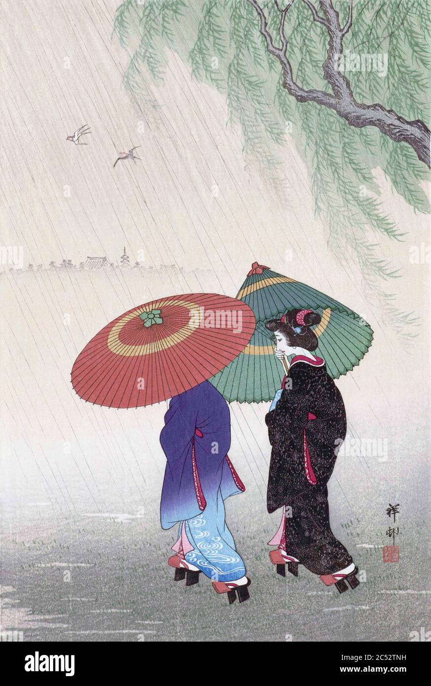Deux femmes dans la pluie, par l'artiste japonais Ohara Koson, 1877 - 1945. Ohara Koson faisait partie du mouvement Shin-hanga, ou de nouvelles gravures. Banque D'Images
