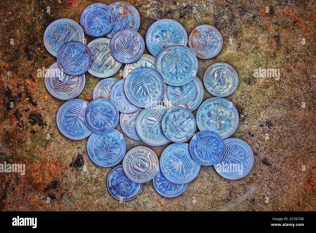 De belles pièces de monnaie anciennes en forme de rond Banque D'Images