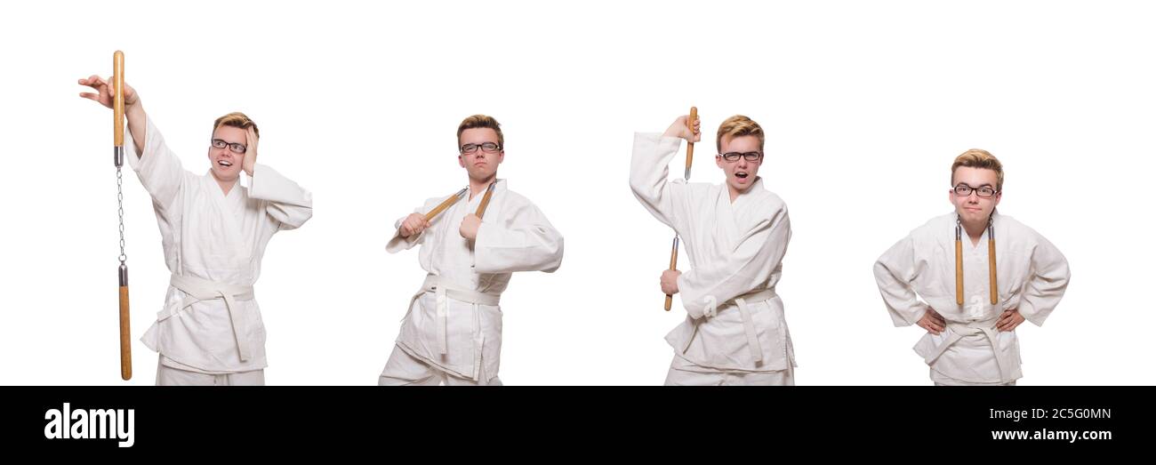 Le funny karate fighter avec nunchucks on white Banque D'Images