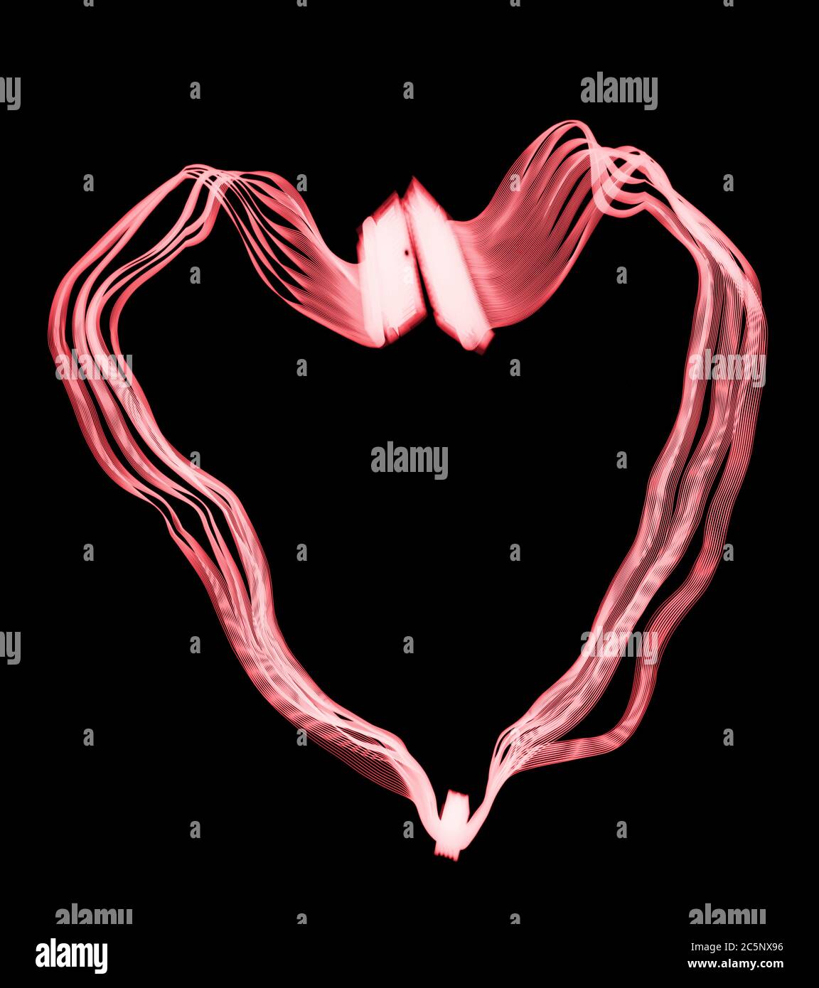 Câble en nappe en forme de cœur, rayons X de couleur. Banque D'Images