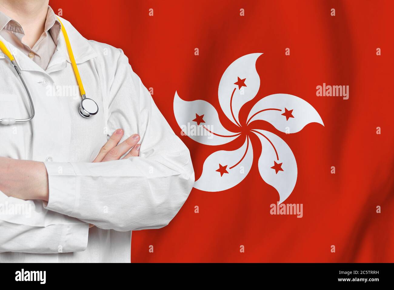 Hong Kong région administrative spéciale de la République populaire de Chine concept de santé avec un médecin sur fond de drapeau HKSAR. Assurance médicale, Banque D'Images