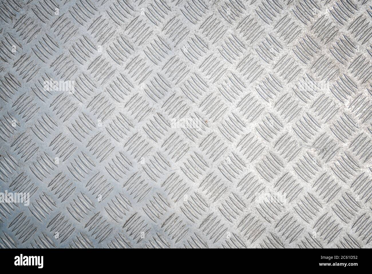 Contexte industriel. Plaque en métal diamant connue sous le nom de plaque à chakkered ou plaque de seuil. Motif métallique. Banque D'Images