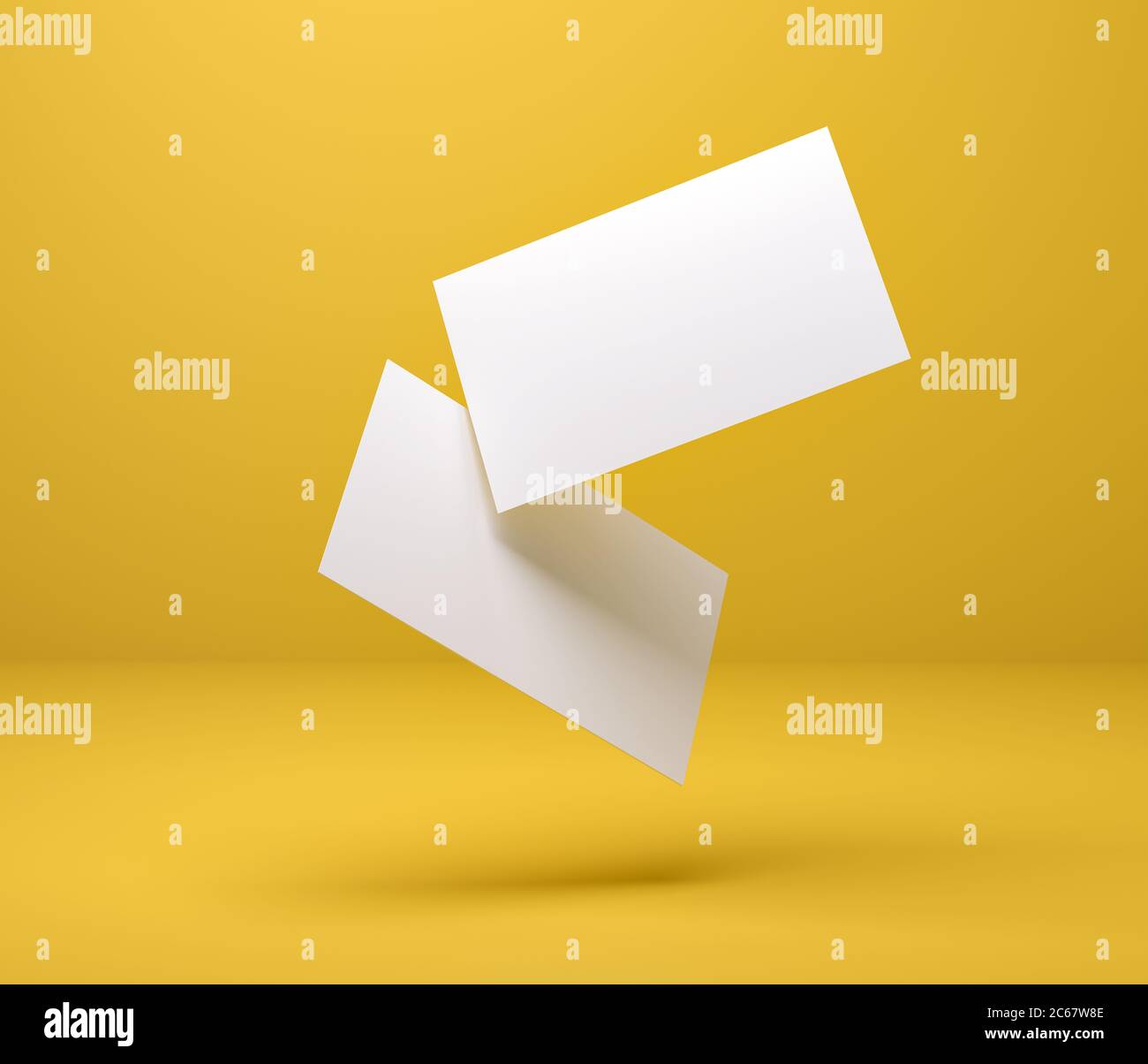 illustration 3d. Deux cartes de visite dans l'espace, pour la marque avec des ombres, sur un fond jaune. Rendu. Banque D'Images
