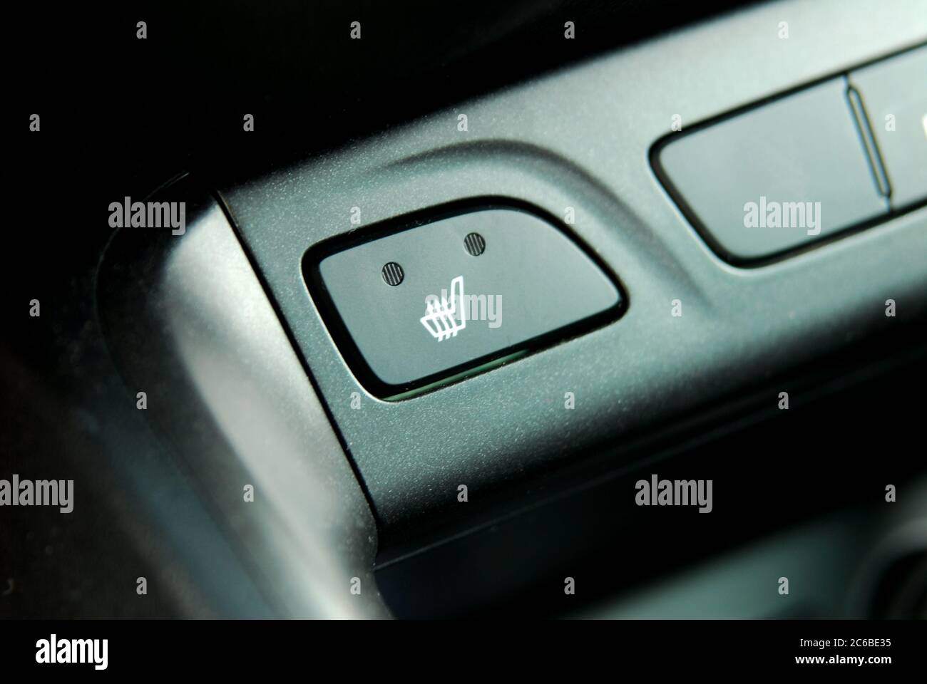 Commutateur de siège chauffant, détail du bouton des sièges chauffants dans  une voiture Photo Stock - Alamy