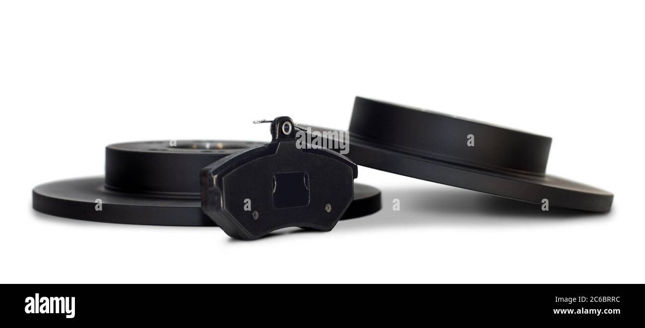 Plaquette et disque de frein. Une plaquette de frein et deux nouveaux disques de frein pour la voiture. Banque D'Images