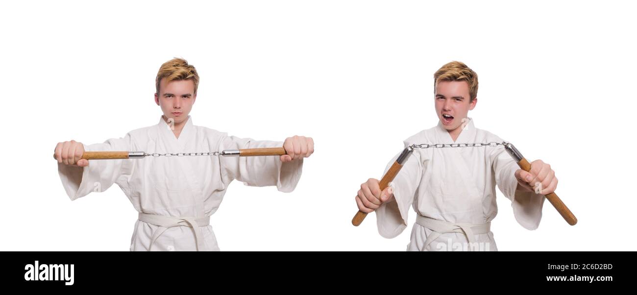 Le funny karate fighter avec nunchucks on white Banque D'Images