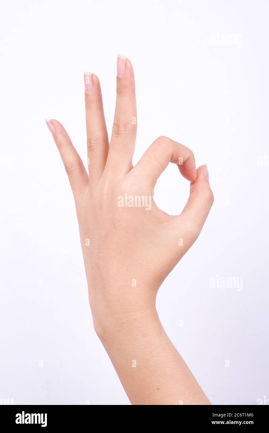 les symboles de main de doigt isolé le concept de la main gestante signe ok d'accord sur fond blanc Banque D'Images