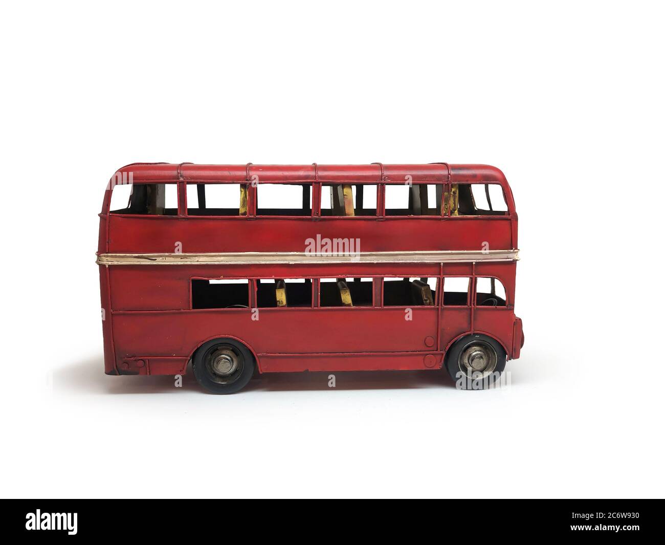 Isolé rouge bus double deckers jouets style vintage, est sur fond blanc. Masque. Banque D'Images