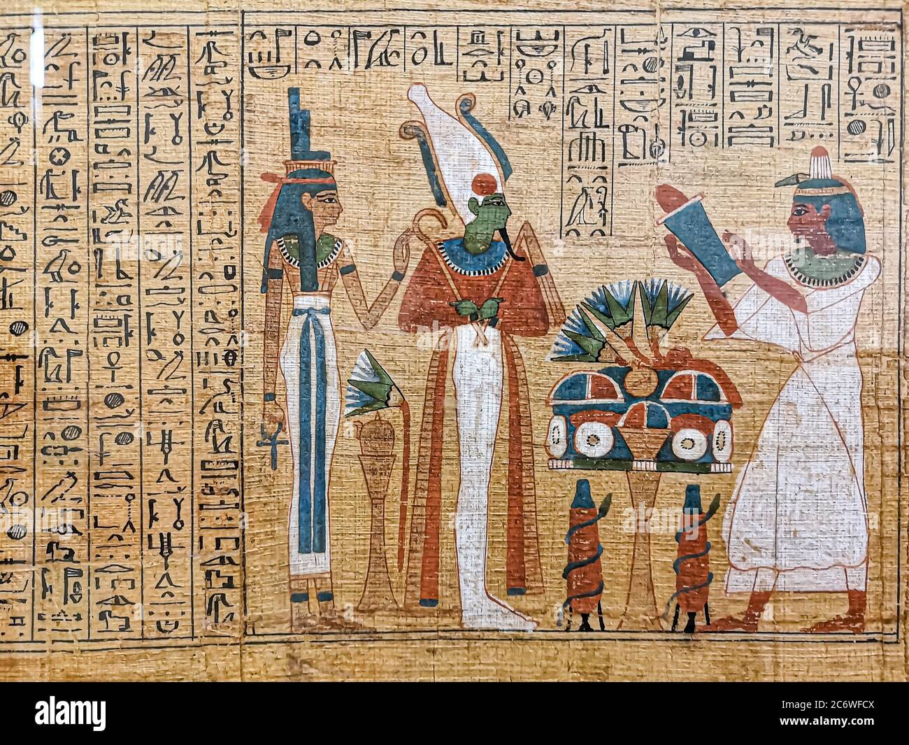 Papyrus égyptien ancien, image des dieux sur le papyrus. Banque D'Images