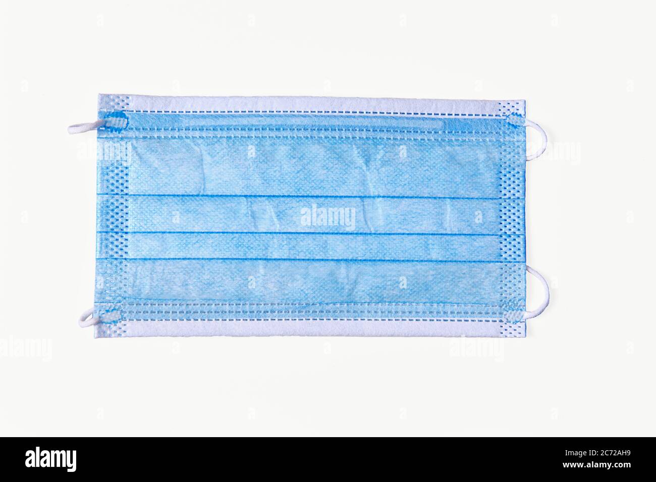 masque de protection bleu isolé sur fond blanc. Banque D'Images