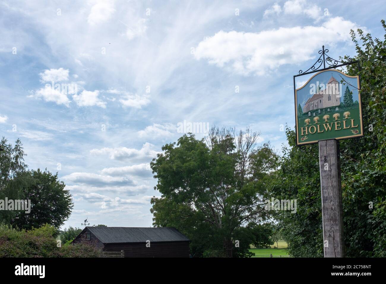 Panneau du village à Holwell, Hertfordshire, Angleterre Banque D'Images