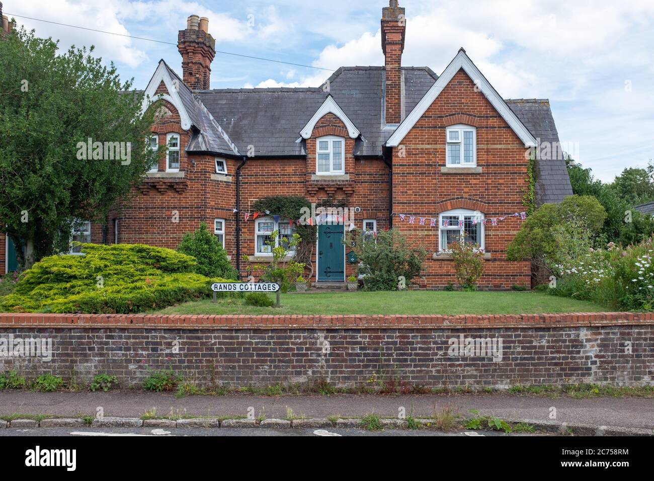 Jolies cottages dans le village de Holwell, dans le Hertfordshire Banque D'Images