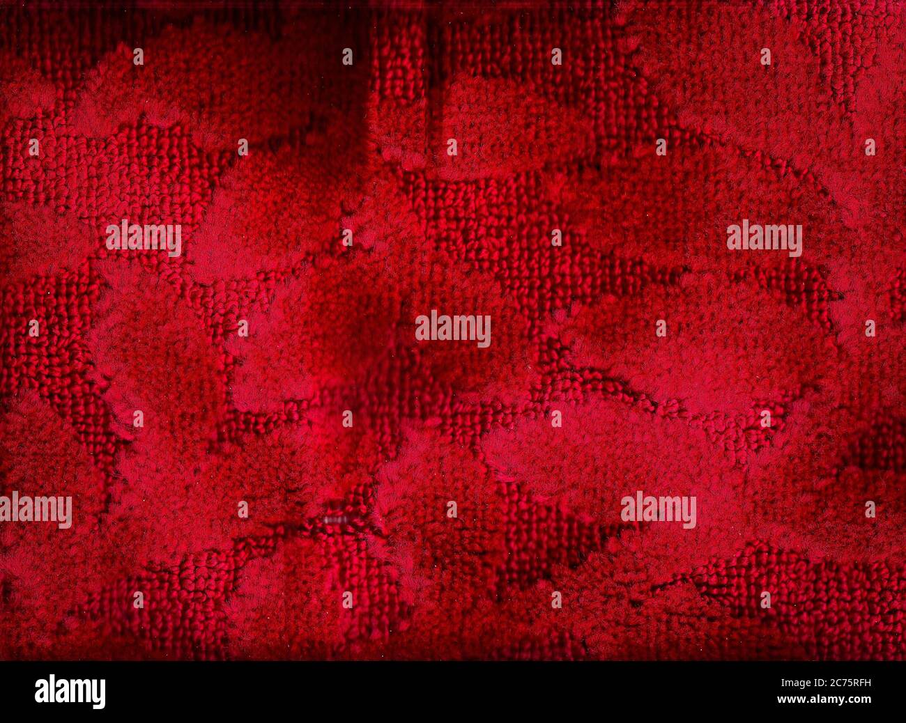 Tapis rouge abstrait arrière-plan. Travail de laine dans le tapis Banque D'Images