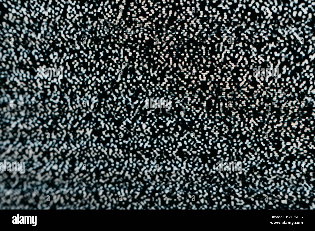 Bruit de cliquetis dû à la texture abstraite de l'écran. Modèle de texture de bruit de cliquetis d'écran de test. Arrière-plan noir et blanc. L'image monochrome abstraite comprend un Banque D'Images