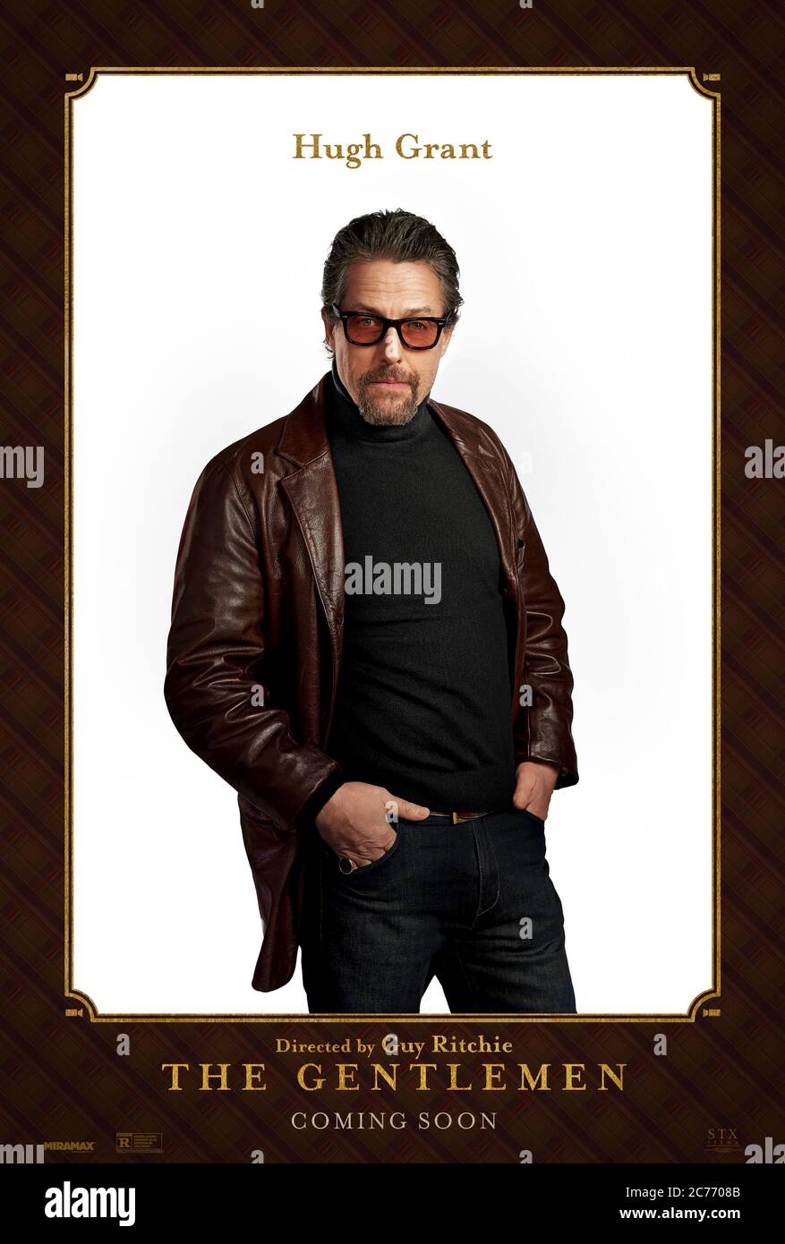 Les messieurs (2019), dirigé par Guy Ritchie, et portant Hugh Grant comme Fletcher le journaliste tabloïd. Banque D'Images