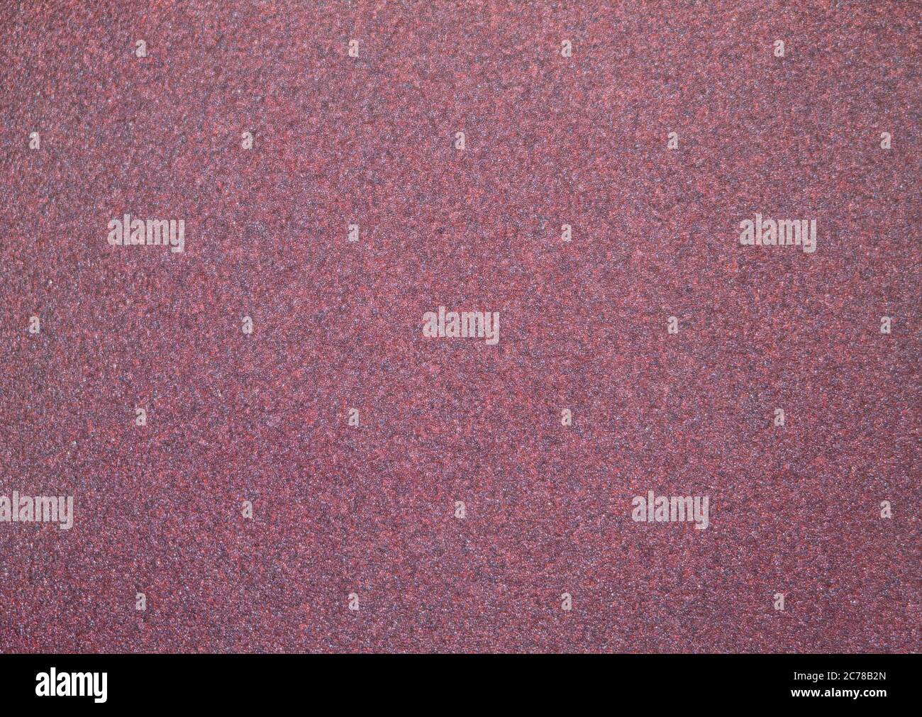 Texture fine du papier émeri. En version rouge violet. Banque D'Images