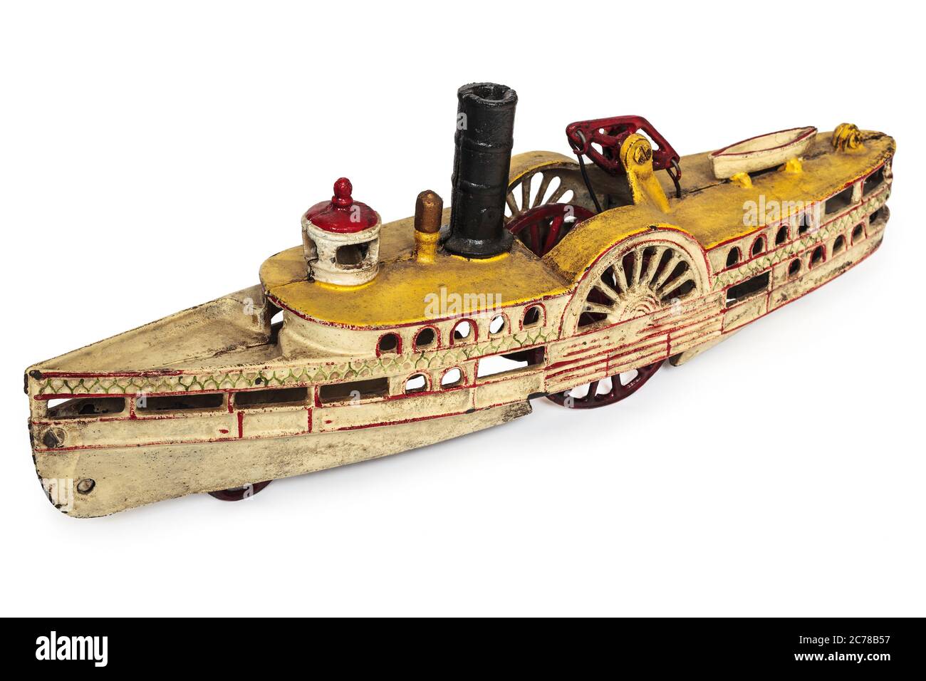 Réplique jouet d'un bateau de rivière vintage avec des roues à aubes isolées sur un fond blanc Banque D'Images