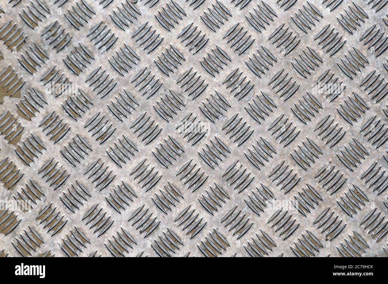 Tôle de damier en acier tôle de plancher d'usine, plancher de plateforme anti-dérapant pour matériaux d'ingénierie. Fond de texture de surface de feuille métallique, ABS Banque D'Images