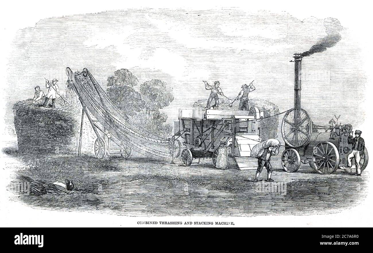 MOISSONNEUSE-BATTEUSE ANCIENNE. Système à vapeur pour le battage et le chargement du blé, environ 1850 Banque D'Images