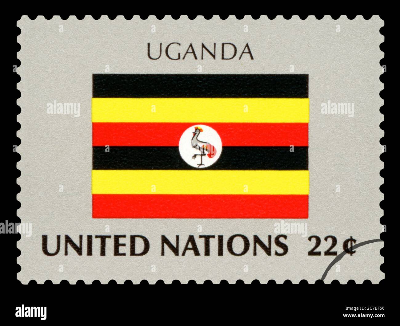 OUGANDA - timbre de poste du drapeau national de l'Ouganda, série des Nations Unies, vers 1984. Isolé sur fond noir. Banque D'Images