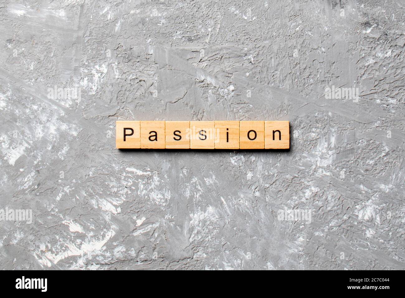 Passion mot écrit sur une cale en bois. passion texte sur table, concept. Banque D'Images