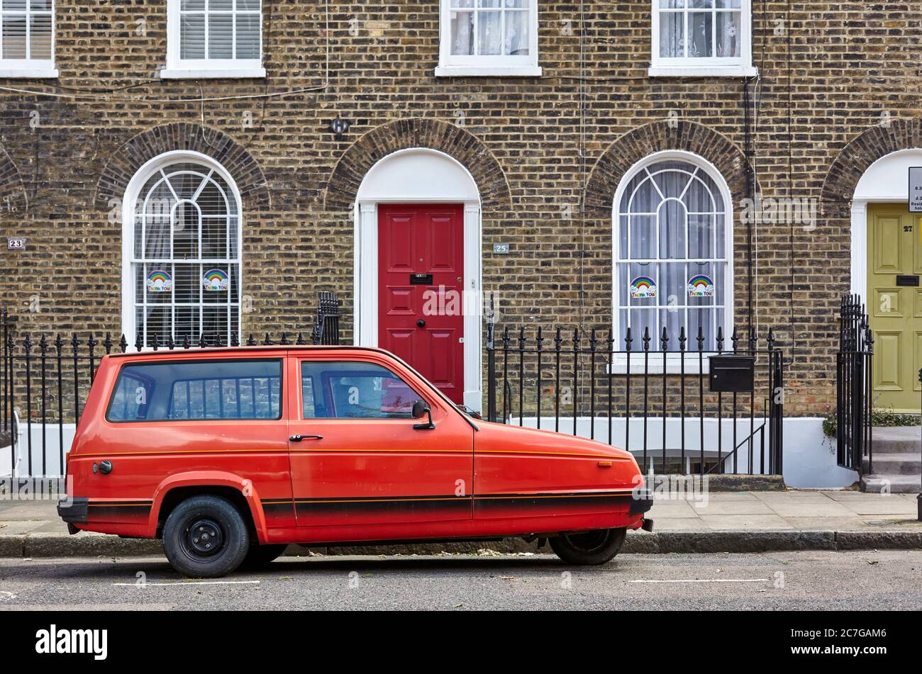 Reliant Robin dans Islington Street, Londres. Banque D'Images