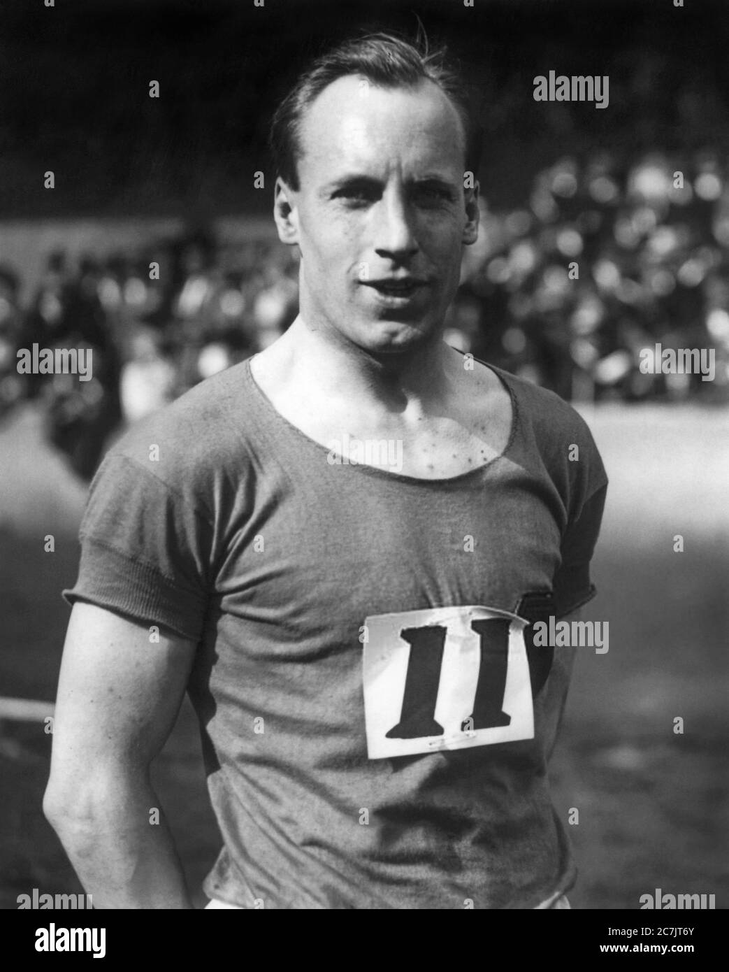 Eric Liddell (1902-1945), médaillé d'or olympique britannique et missionnaire chrétien en Chine. Photographié aux Jeux Olympiques de 1924 à Paris, Liddell, un chrétien dévot, a refusé de courir dans sa course préférée de 100 mètres parce que l'événement devait avoir lieu dimanche. Au lieu de cela, il a couru dans la course de 400 mètres en semaine et a gagné. Liddell est présenté dans le film primé aux Oscars, Chariots of Fire. Banque D'Images