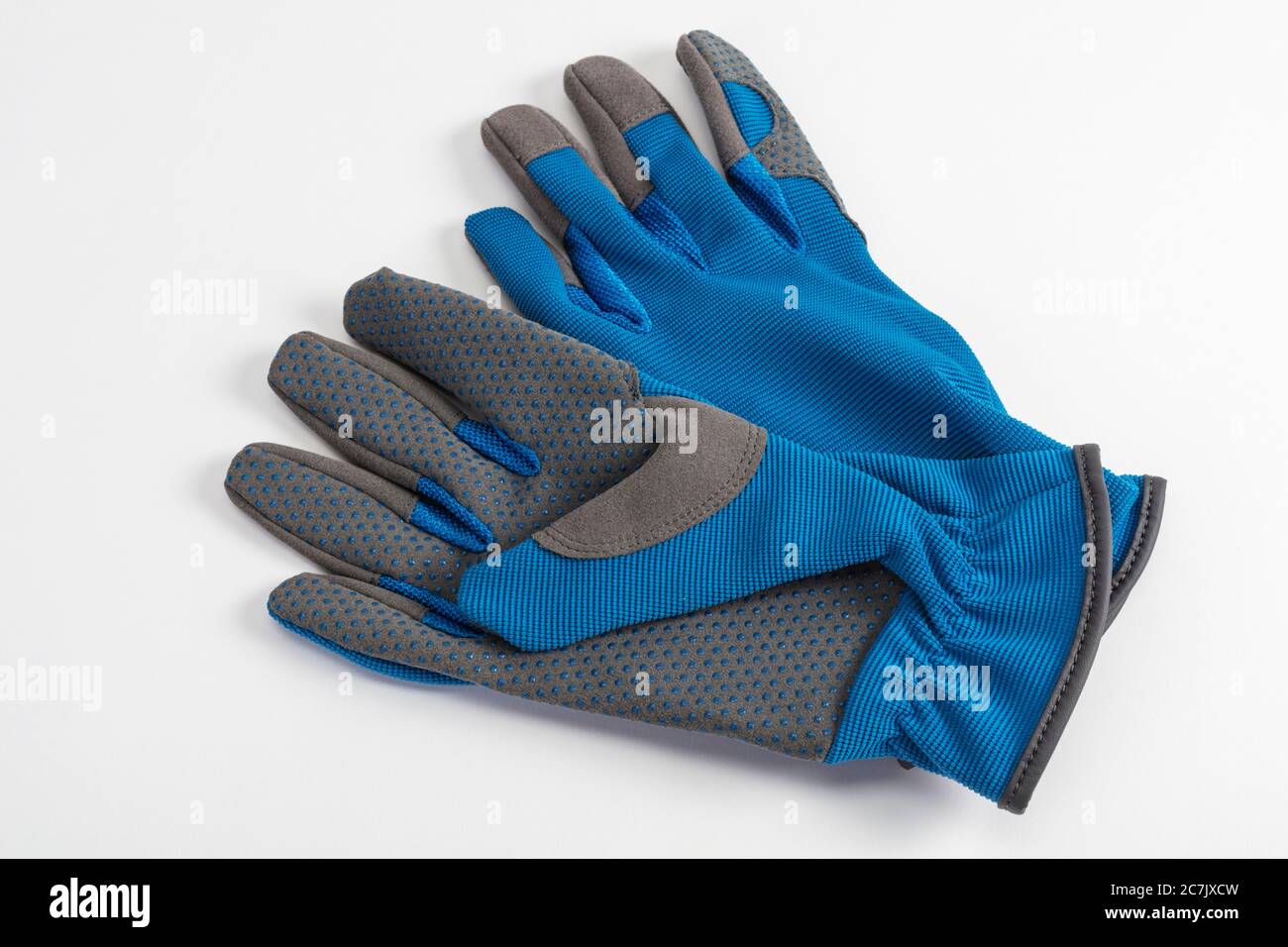 Gants de jardinage, gris bleu, fond blanc, Banque D'Images