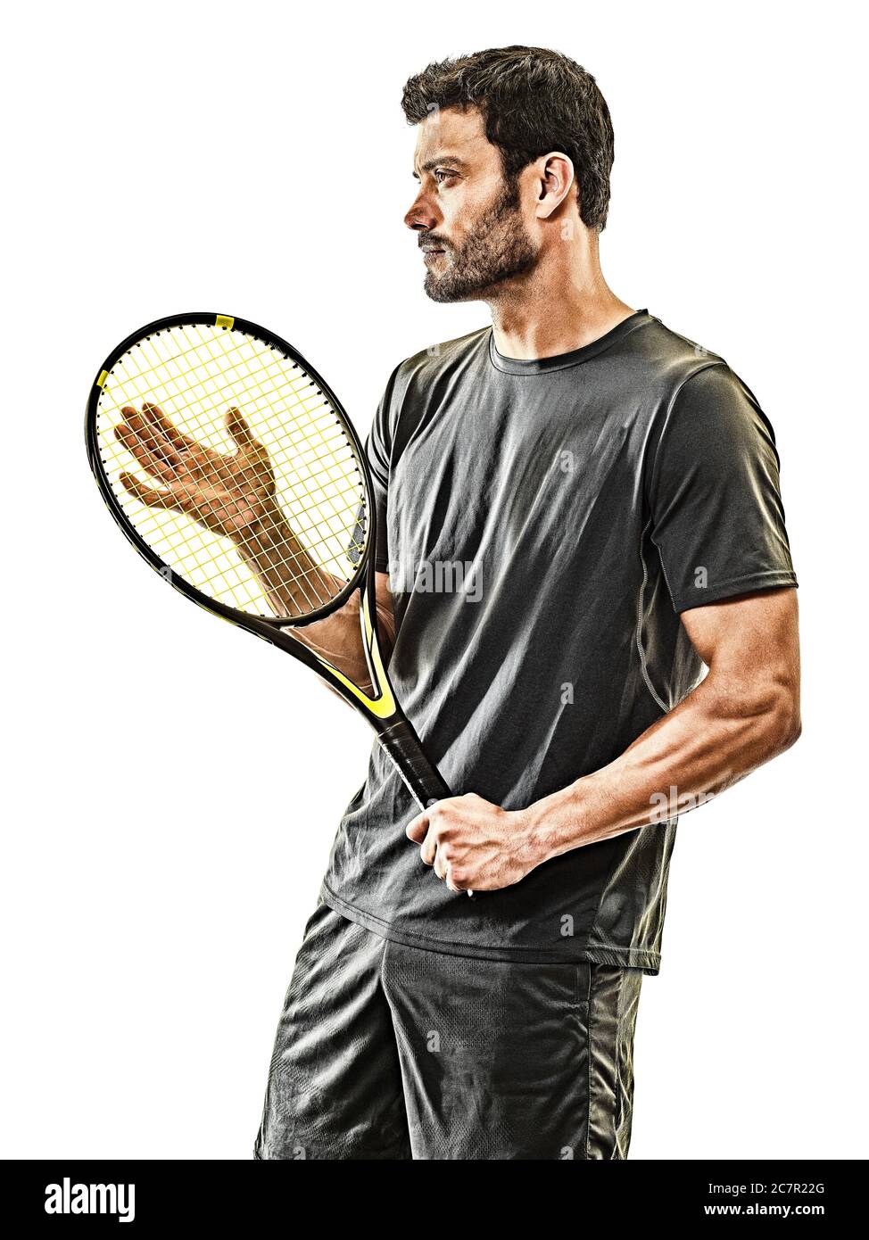 un joueur de tennis caucasien mature en studio isolé sur fond blanc Banque D'Images
