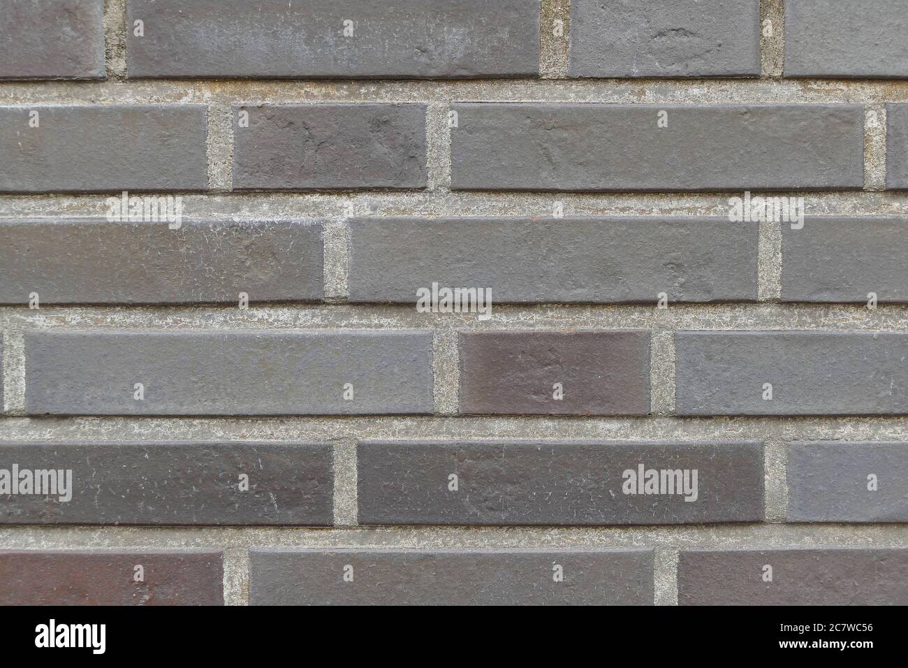 Mur de briques violettes d'une nouvelle maison moderne Banque D'Images